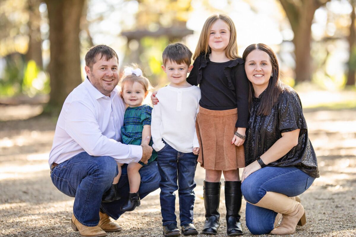 Dustin and Kioka Guillot, the family owners of Site Stash, with their children